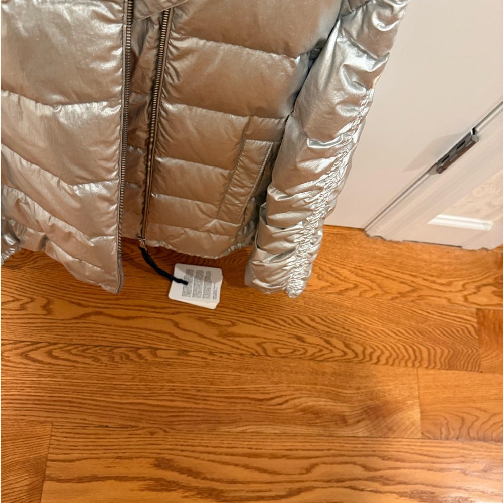 Brand new Moncler jacket. Size 14 may fit slim adult .